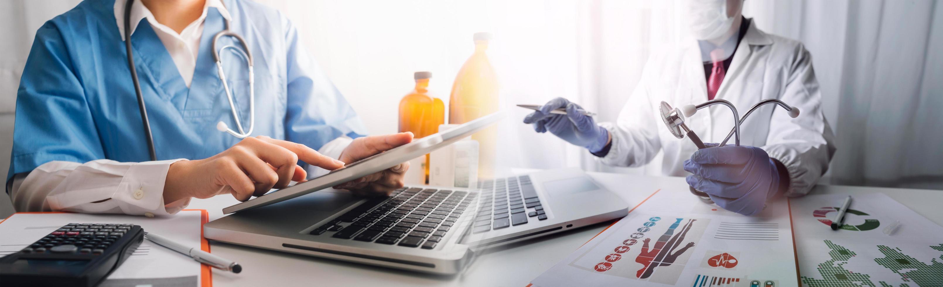 Medicine doctor and stethoscope touching icon medical network connection with modern interface on digital tablet in hospital background. Medical technology network concept photo
