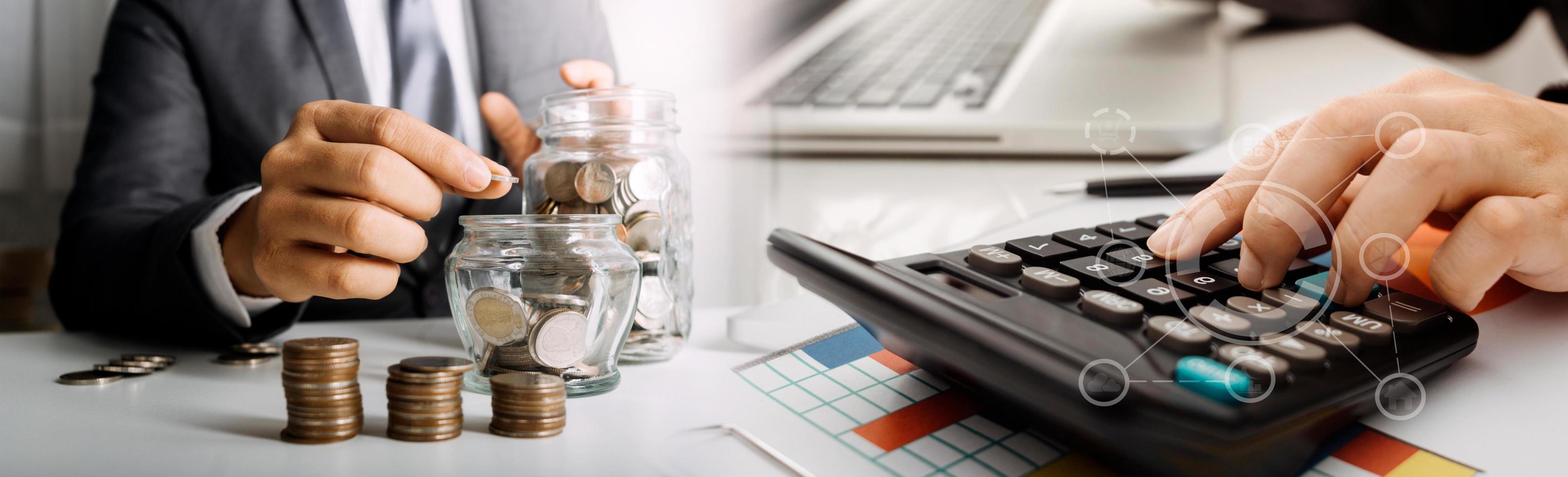 Business accounting concept, Business man using calculator with computer laptop, budget and loan paper in office. photo