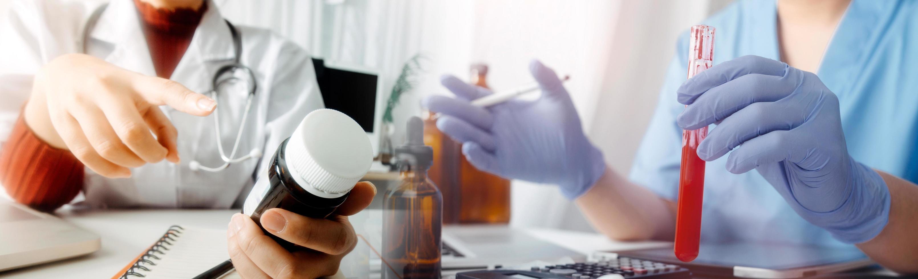 Medicine doctor hand working on a patients x-ray scans digital healthcare and connection with modern virtual screen interface icons, Medical technology and network concept. photo