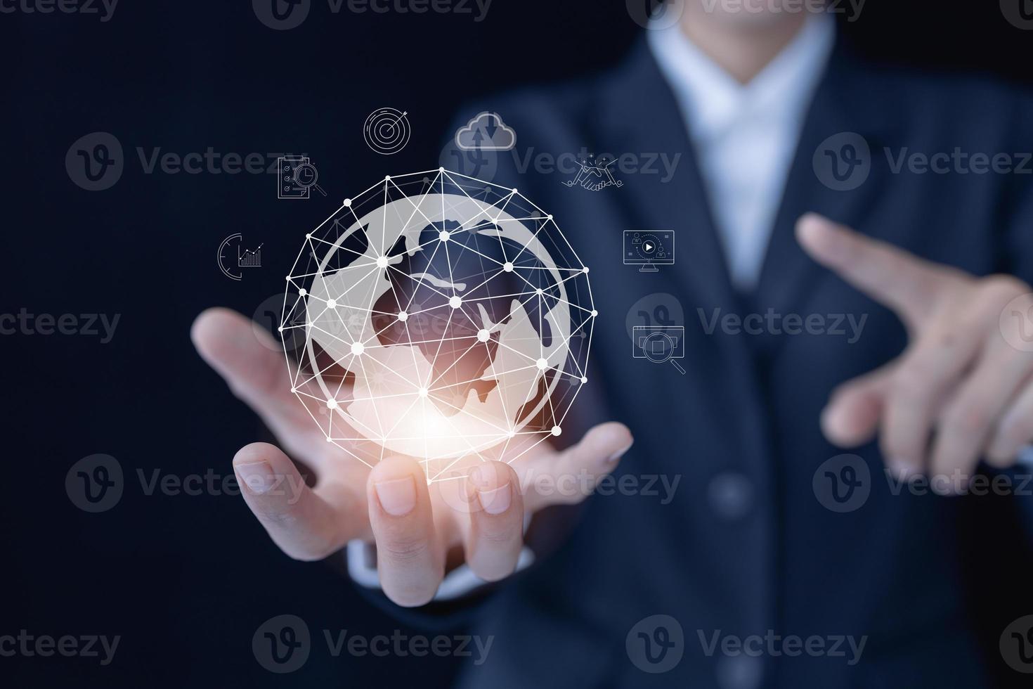 Businessman holding globe, Accessing the Technology Internet, multimedia, Storage Network connection Concept And a large database big data Through internet technology. photo