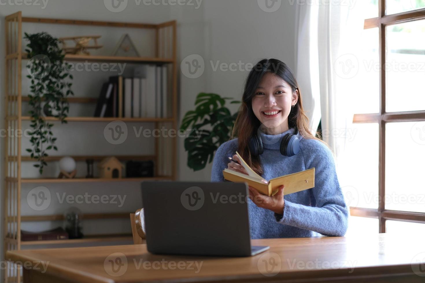 Asian girl student online learning class study online video call zoom teacher, Happy asian girl learn english language online with computer laptop. photo