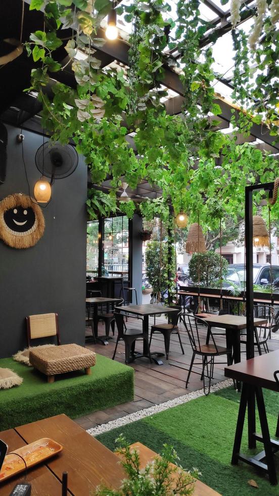 Cafe atmosphere with a green leaf garden theme photo