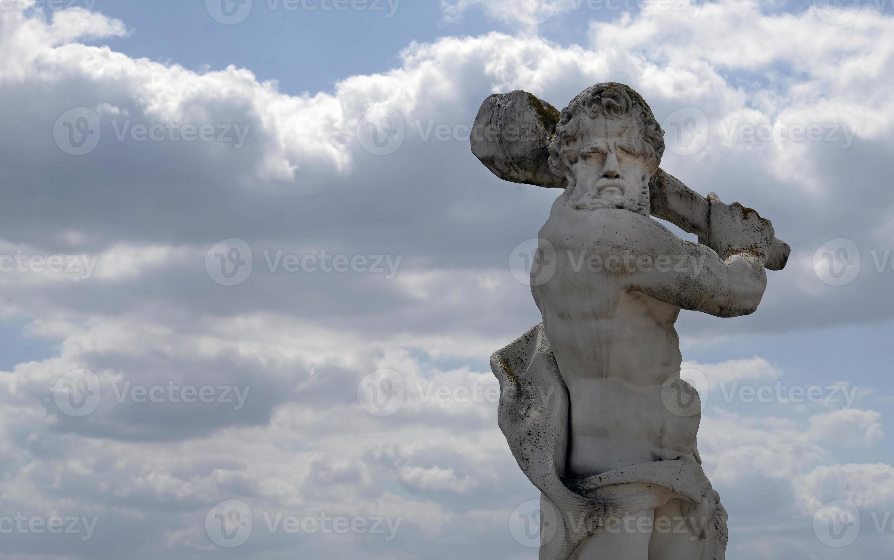 Statue menacingly raising a club to strike 11709803 Stock Photo at Vecteezy