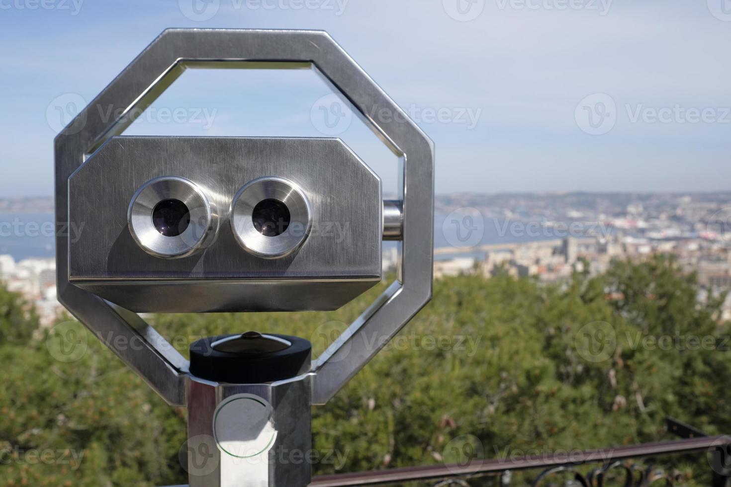 Viewpoint on a hill in Marseille, France, with mounted binoculars photo