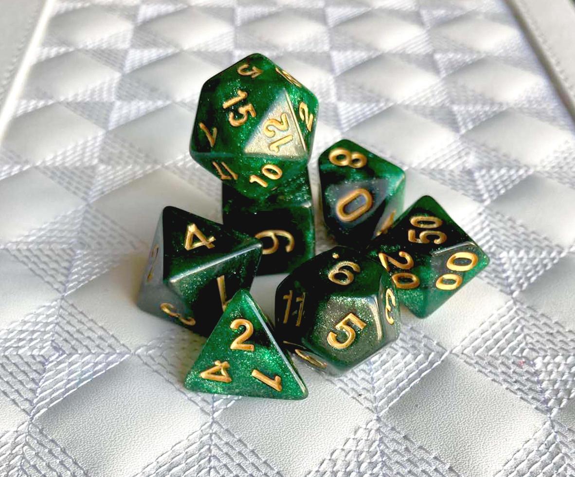 Dice game green polyhedral, MTG dice and cards. photo