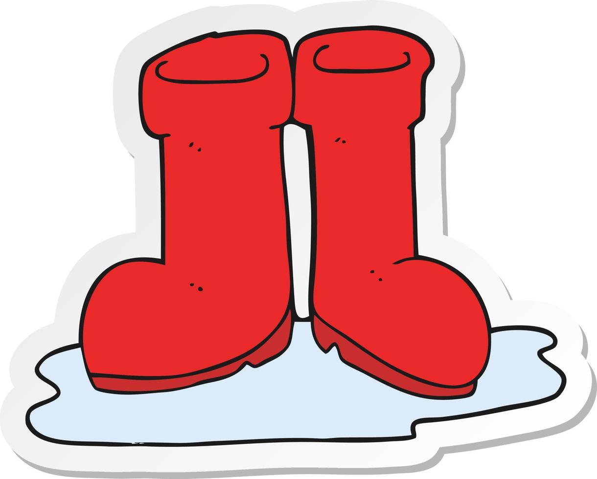 sticker of a cartoon wellington boots in puddle vector
