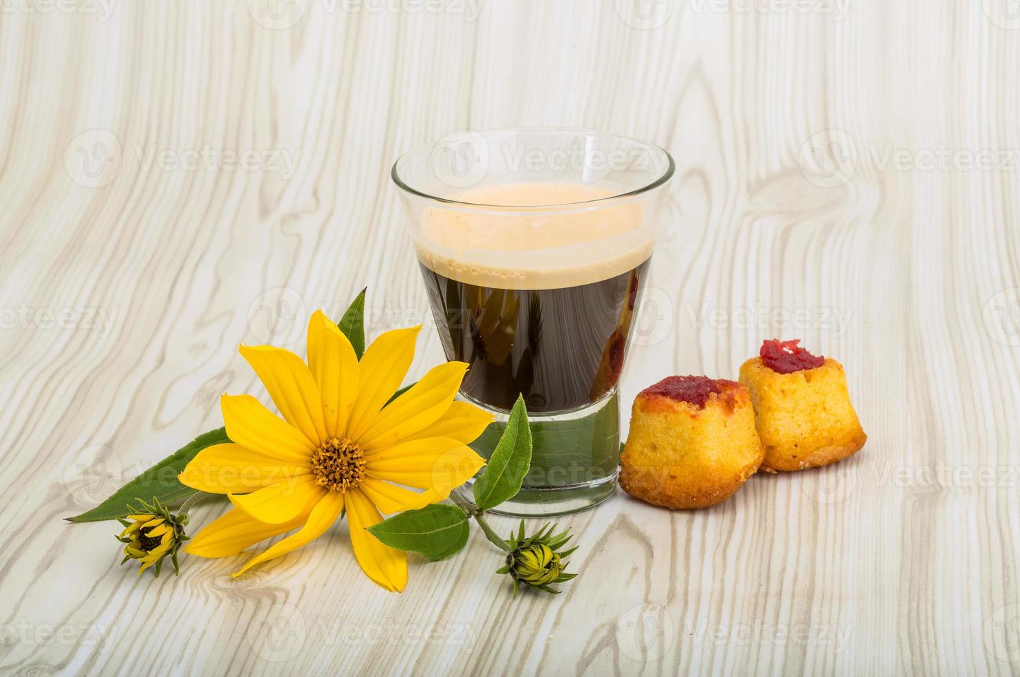 Espresso on wooden background photo