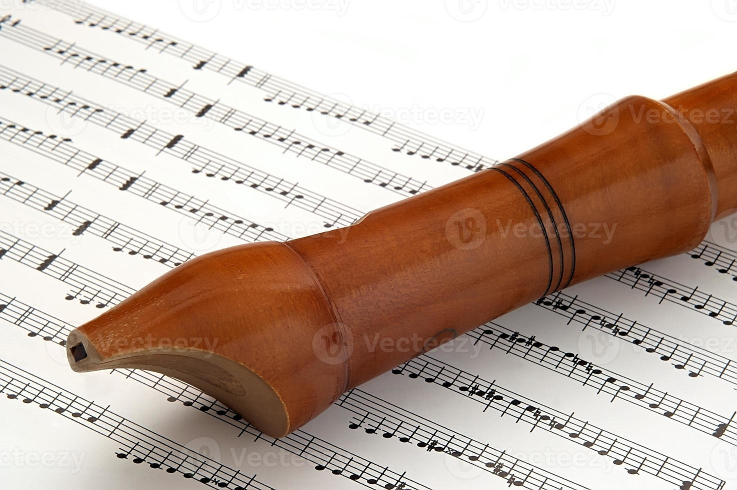 Wooden flute and tone photo