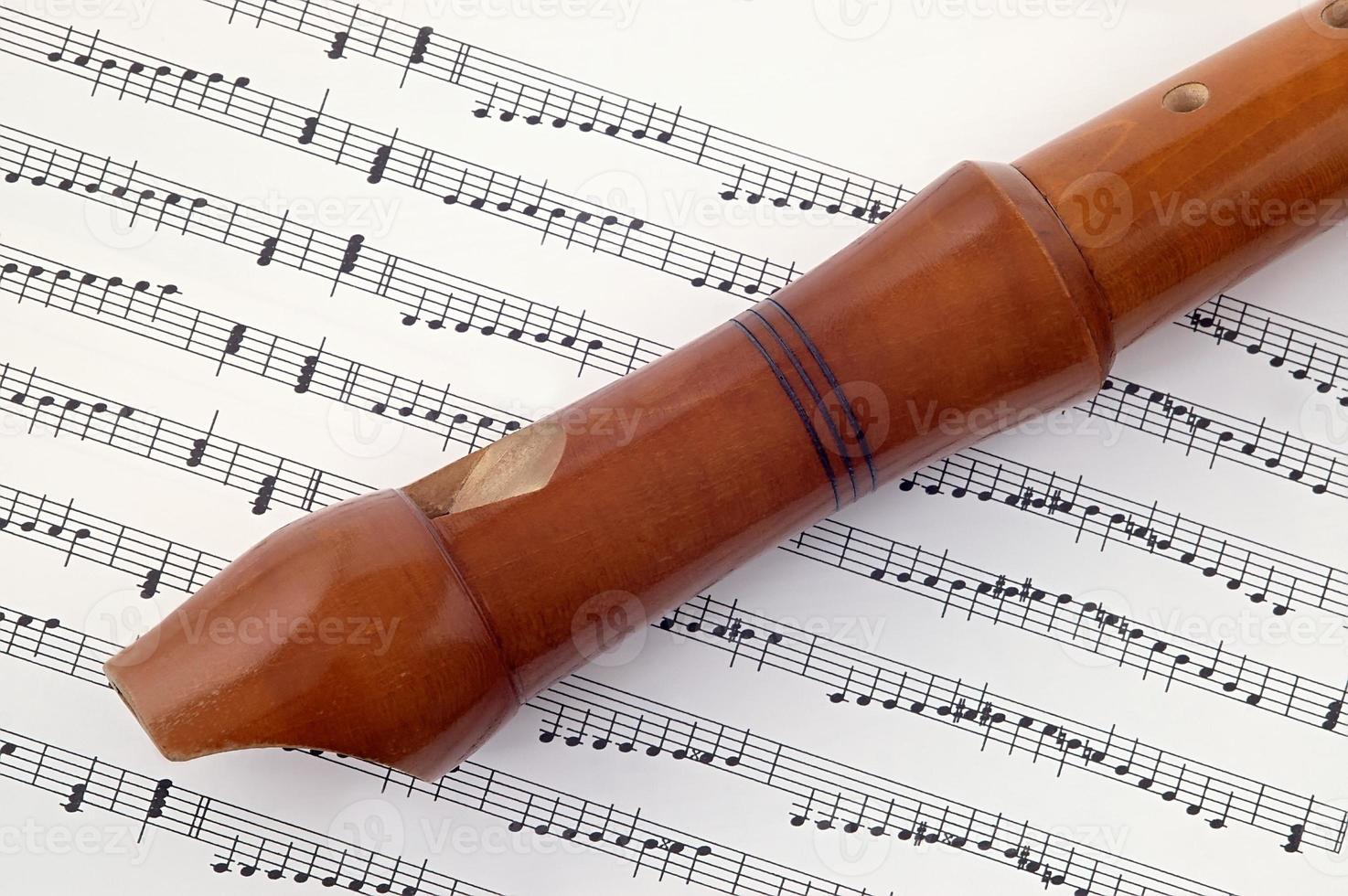 Wooden flute and tone photo