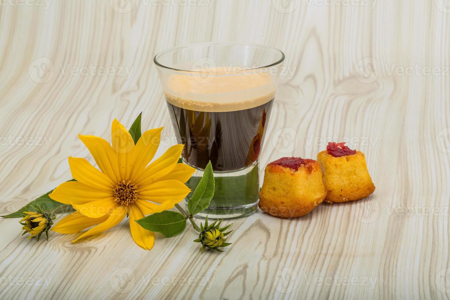Espresso on wooden background photo