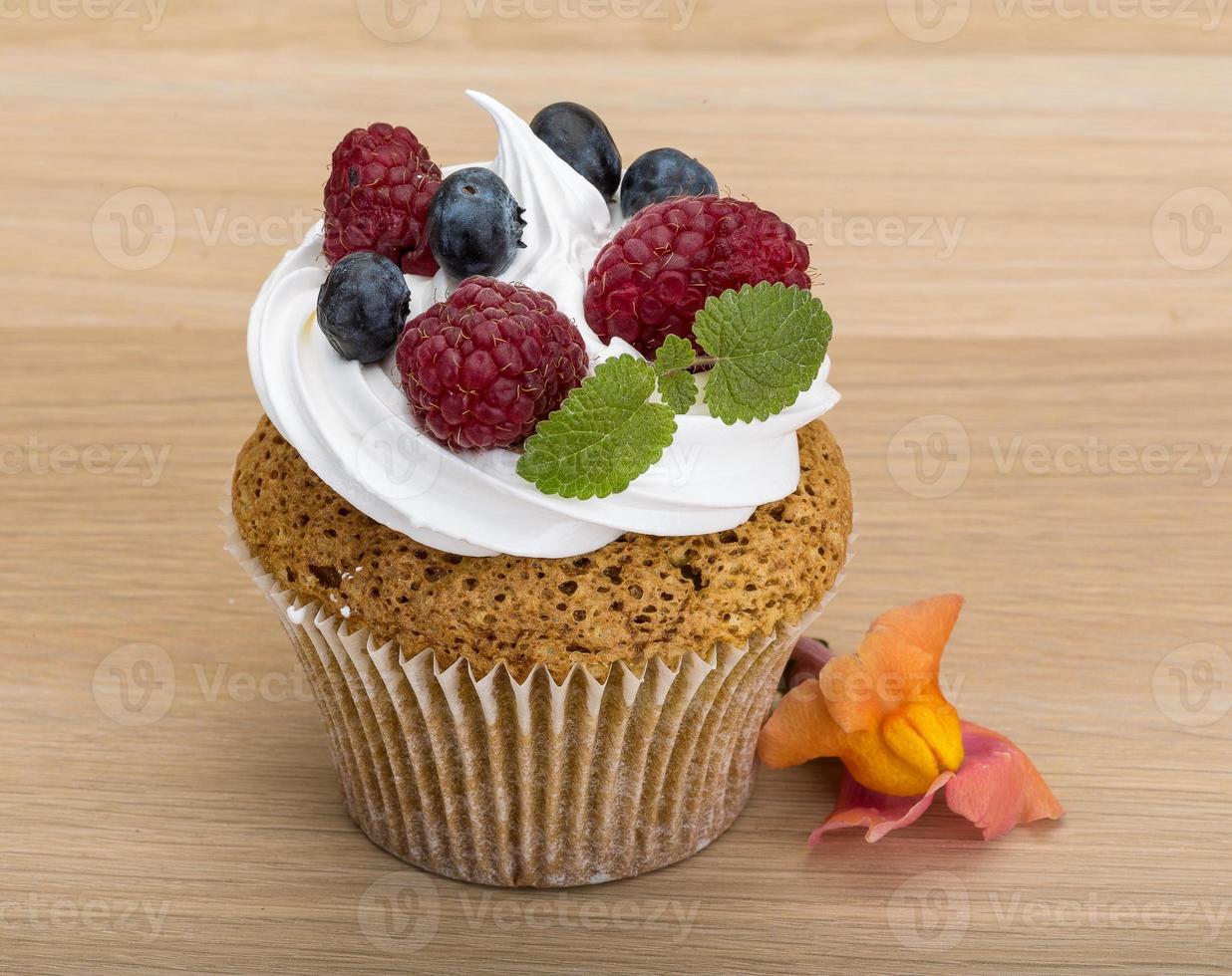 Cupcakes with berries photo