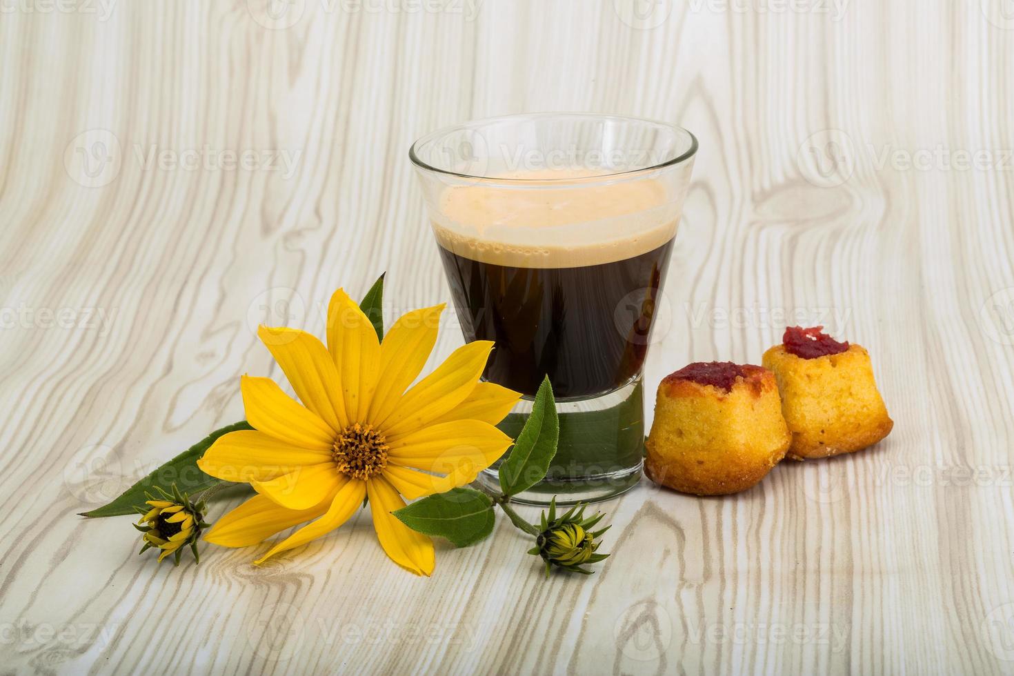 Espresso on wooden background photo