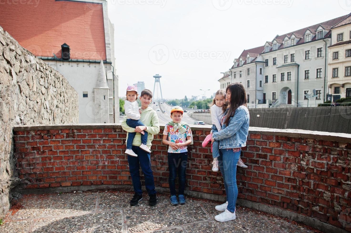 Mother with kids on view of street Bratislava, Slovakia. photo