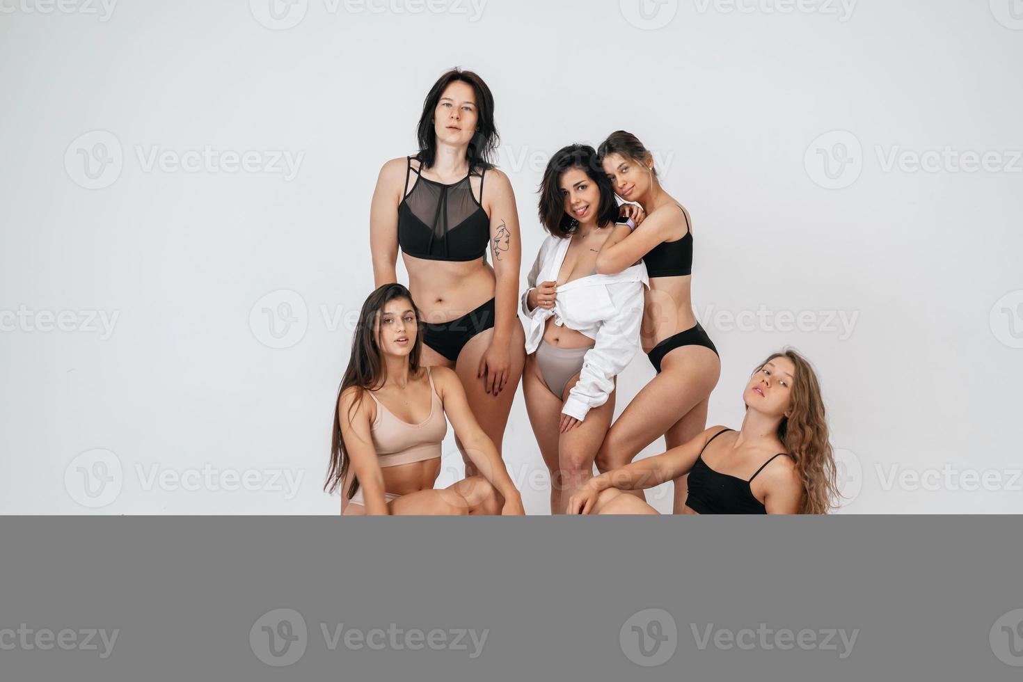 diverse models wearing comfortable underwear, enjoying time together photo