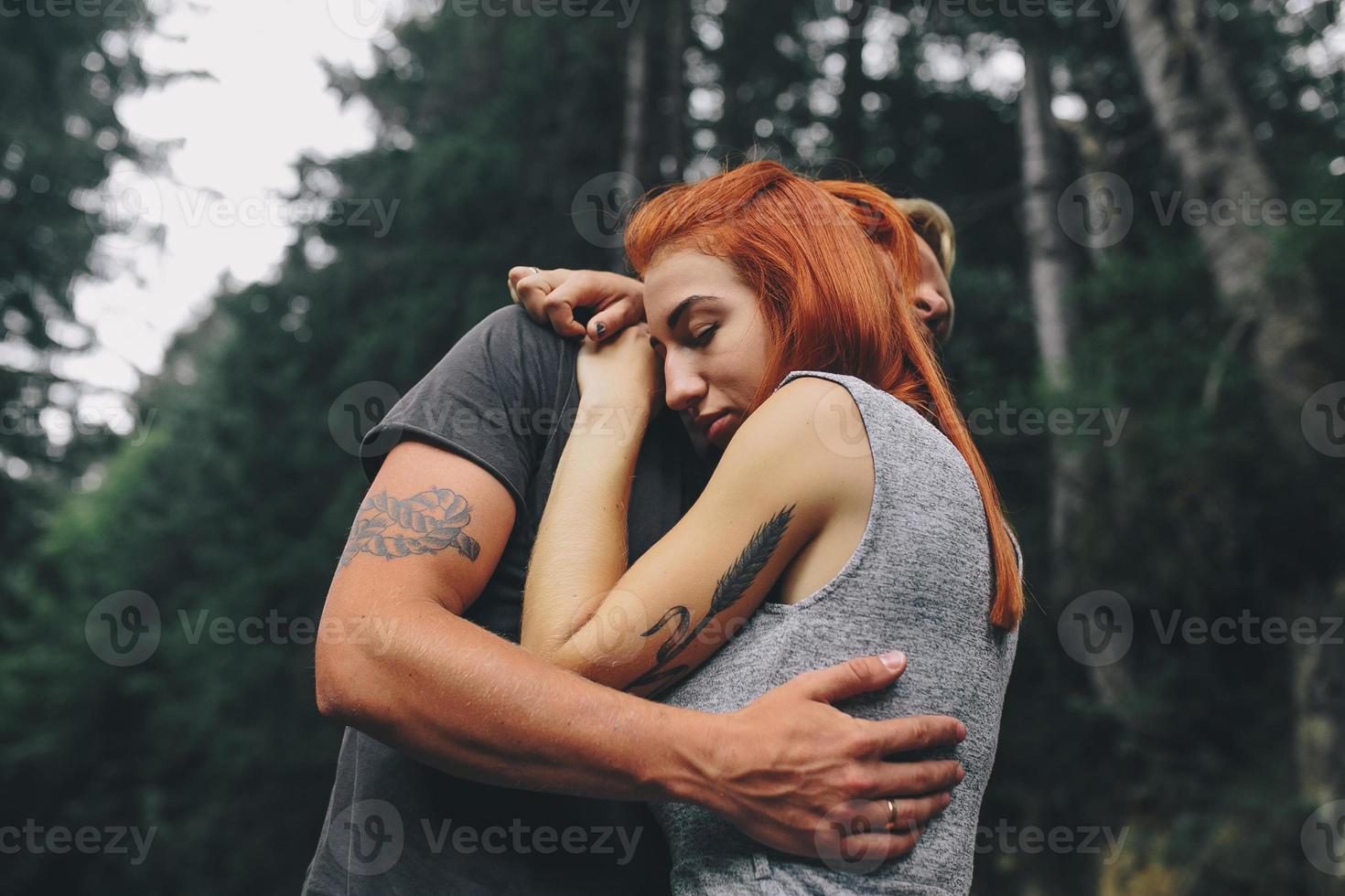 man and woman in nature photo