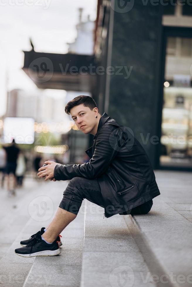 Portrait of man look around. Stylish clothing wear photo