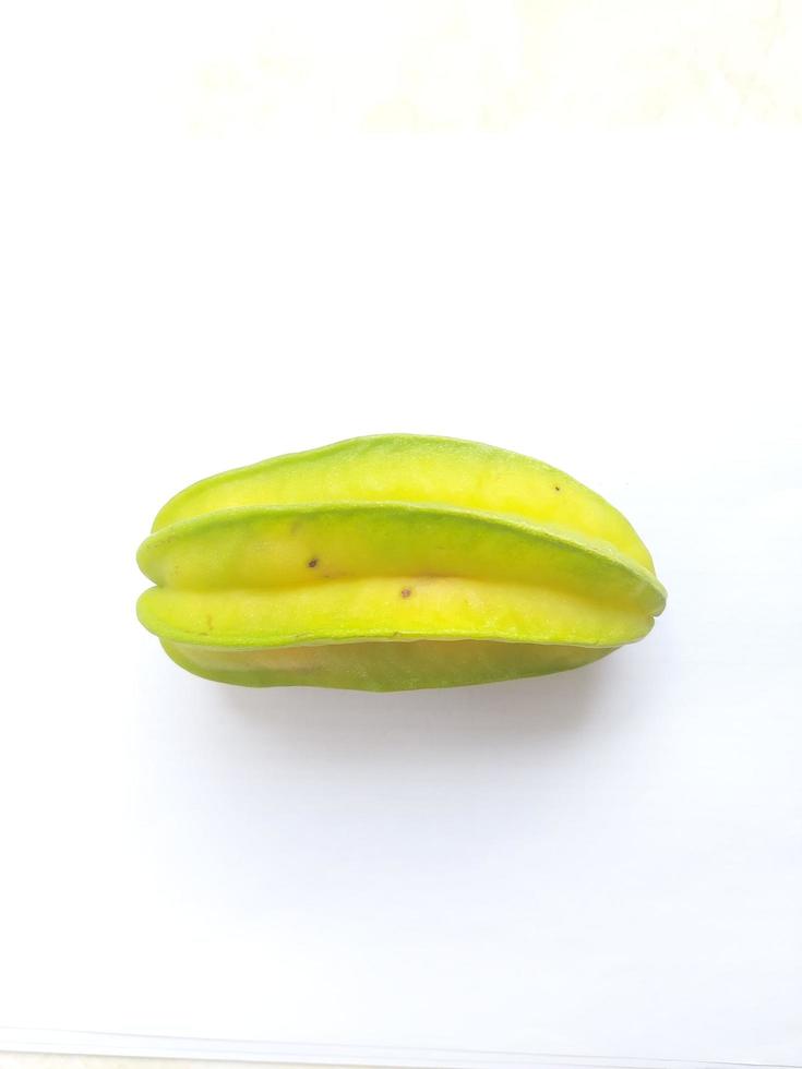 Fresh young star fruit on a white background photo