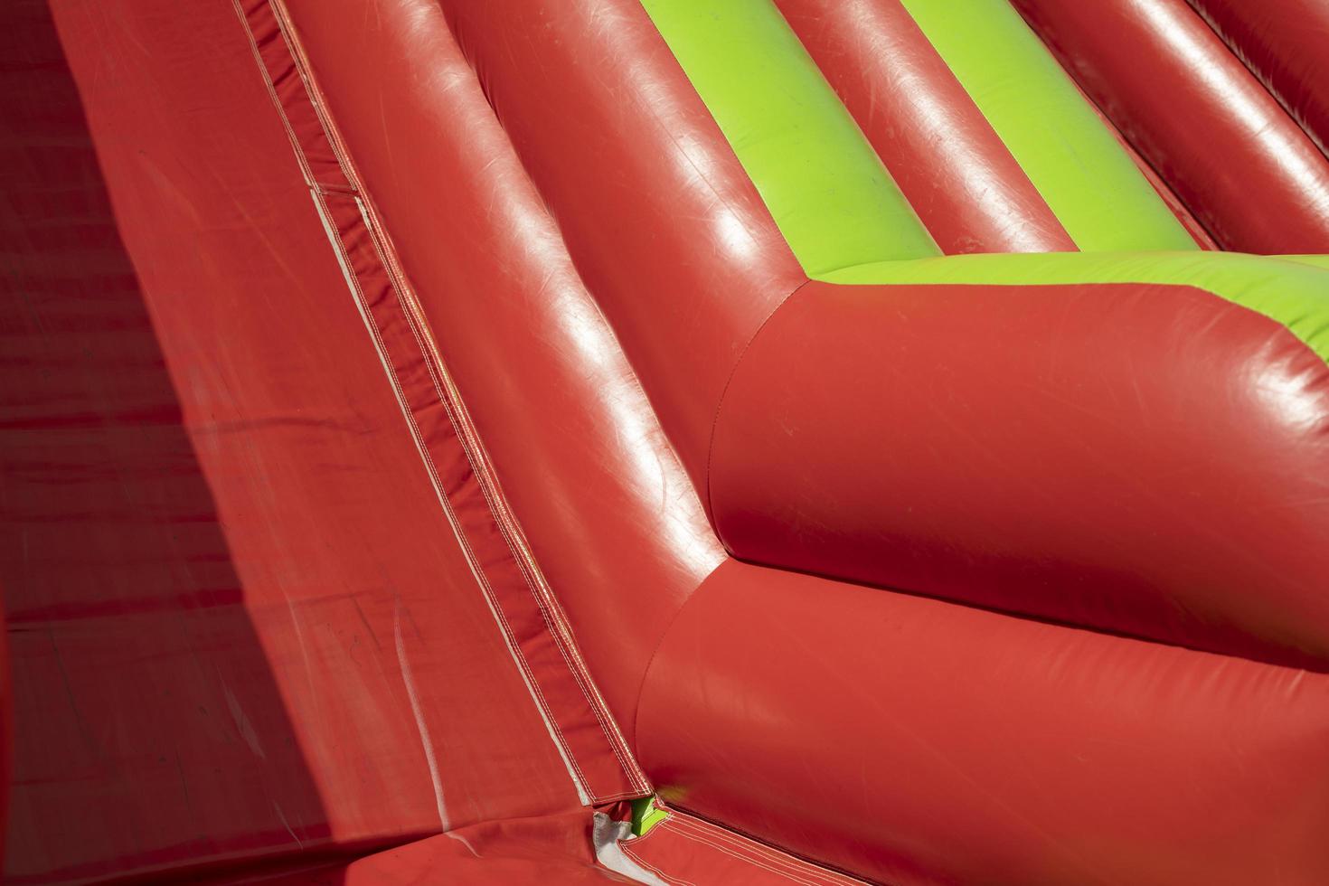 Red inflatable design. Inflatable slide. photo