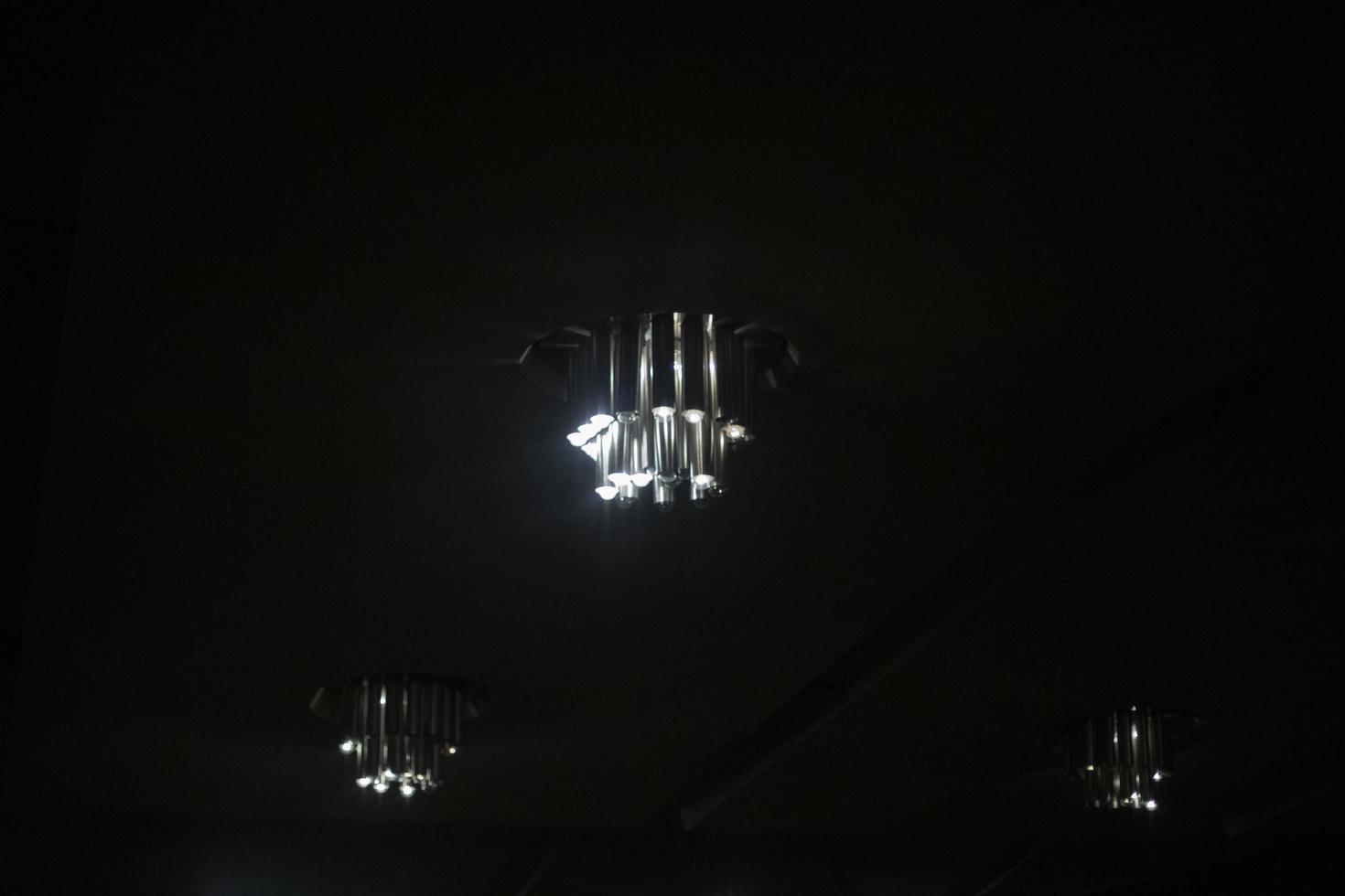 Lamps in interior. Light in room. Ceiling in apartment. photo