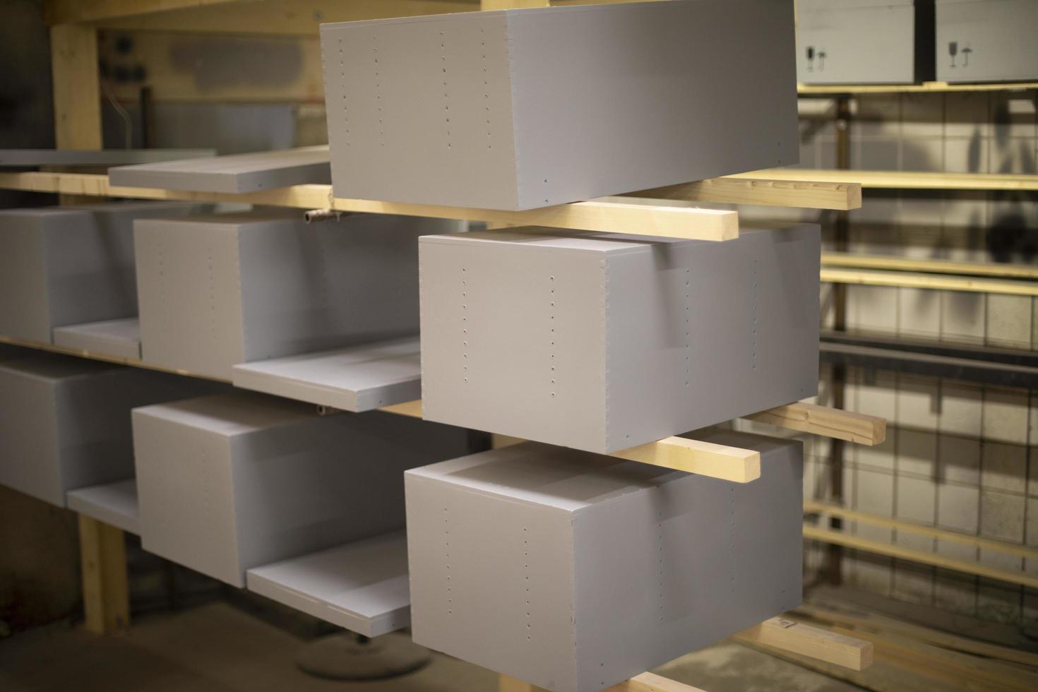Drawers in carpentry workshop. Making boxes. Product made of boards. photo