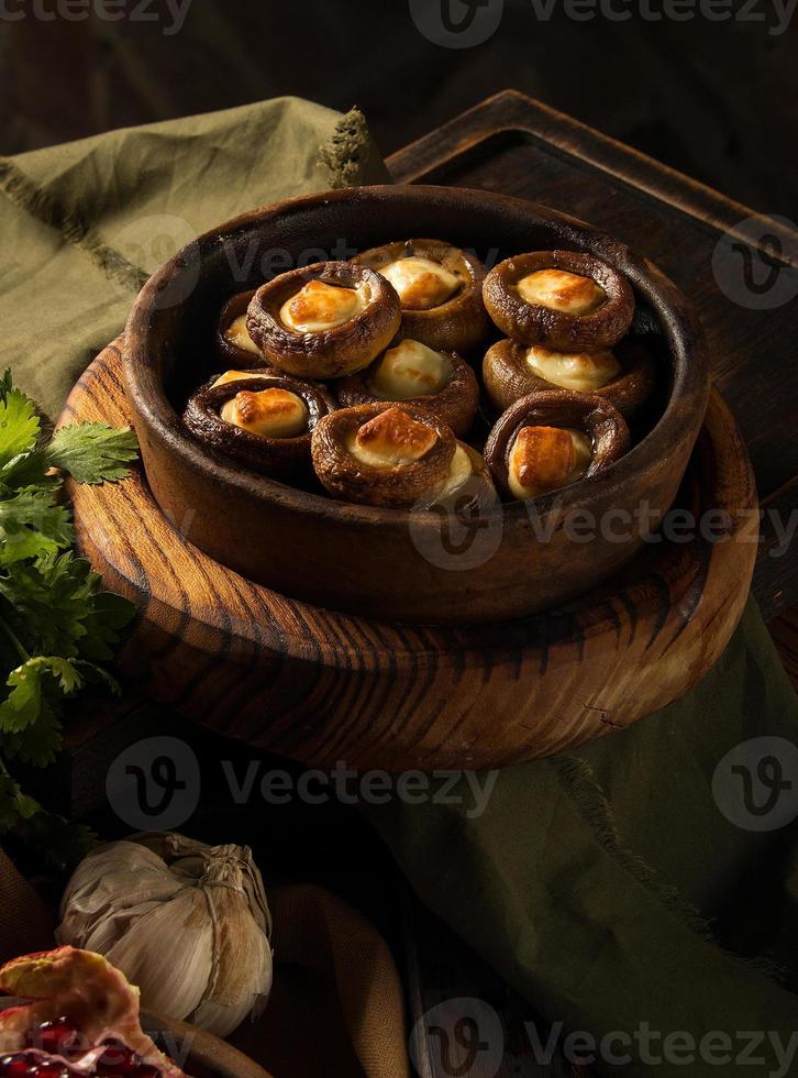 A shot of a dish and pomegranates photo