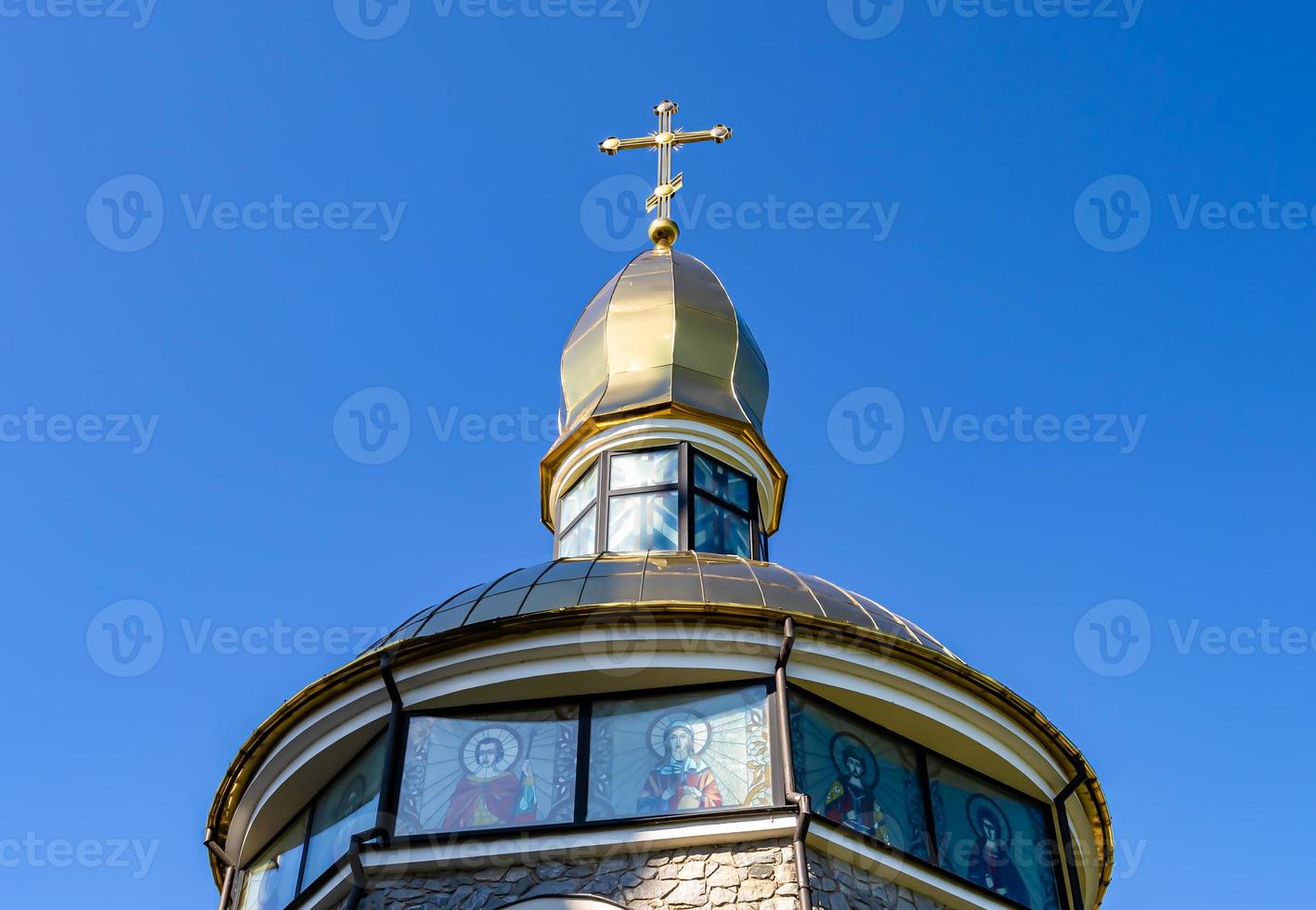 Christian church cross in high steeple tower for prayer photo