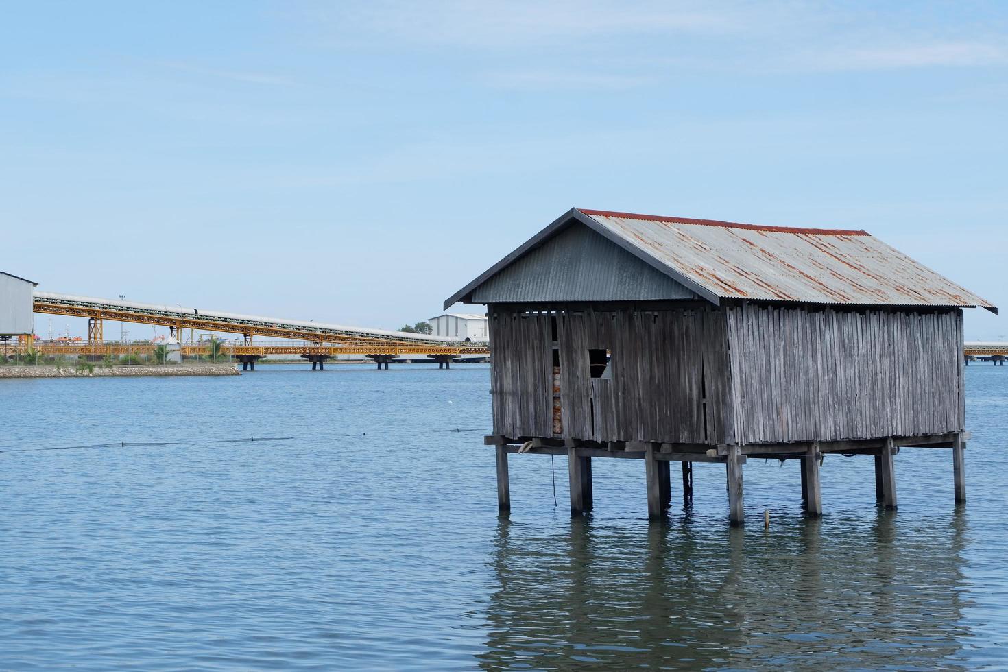 Pangkajene dan Kepulauan, South Sulawesi, Indonesia - April 16, 2022, Scenery of beautiful view of a house above the sea photo