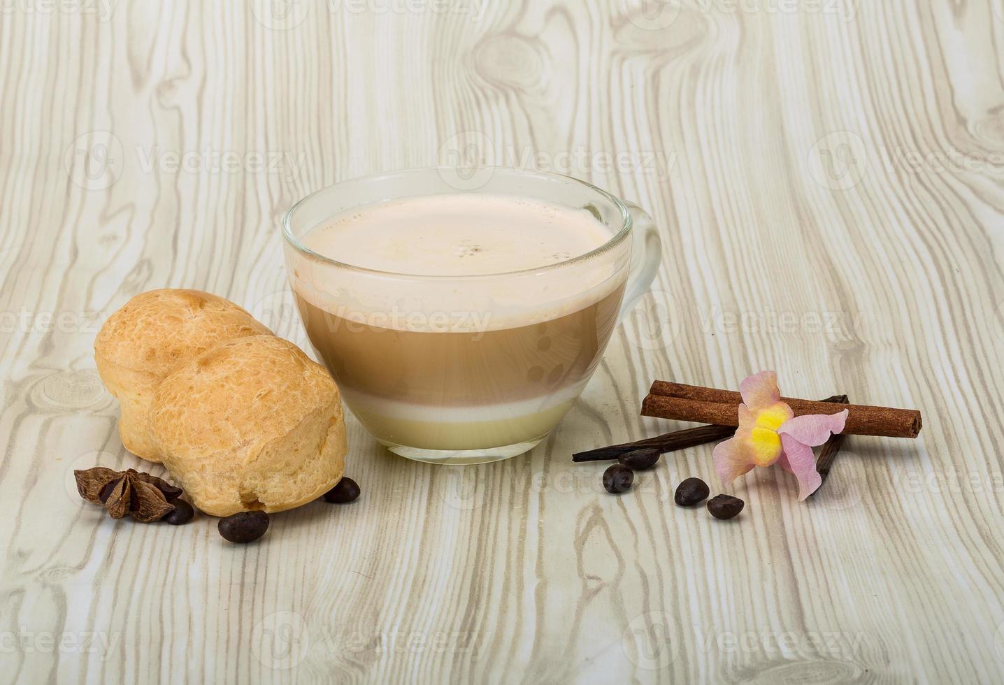 Capucchino with profiteroles photo