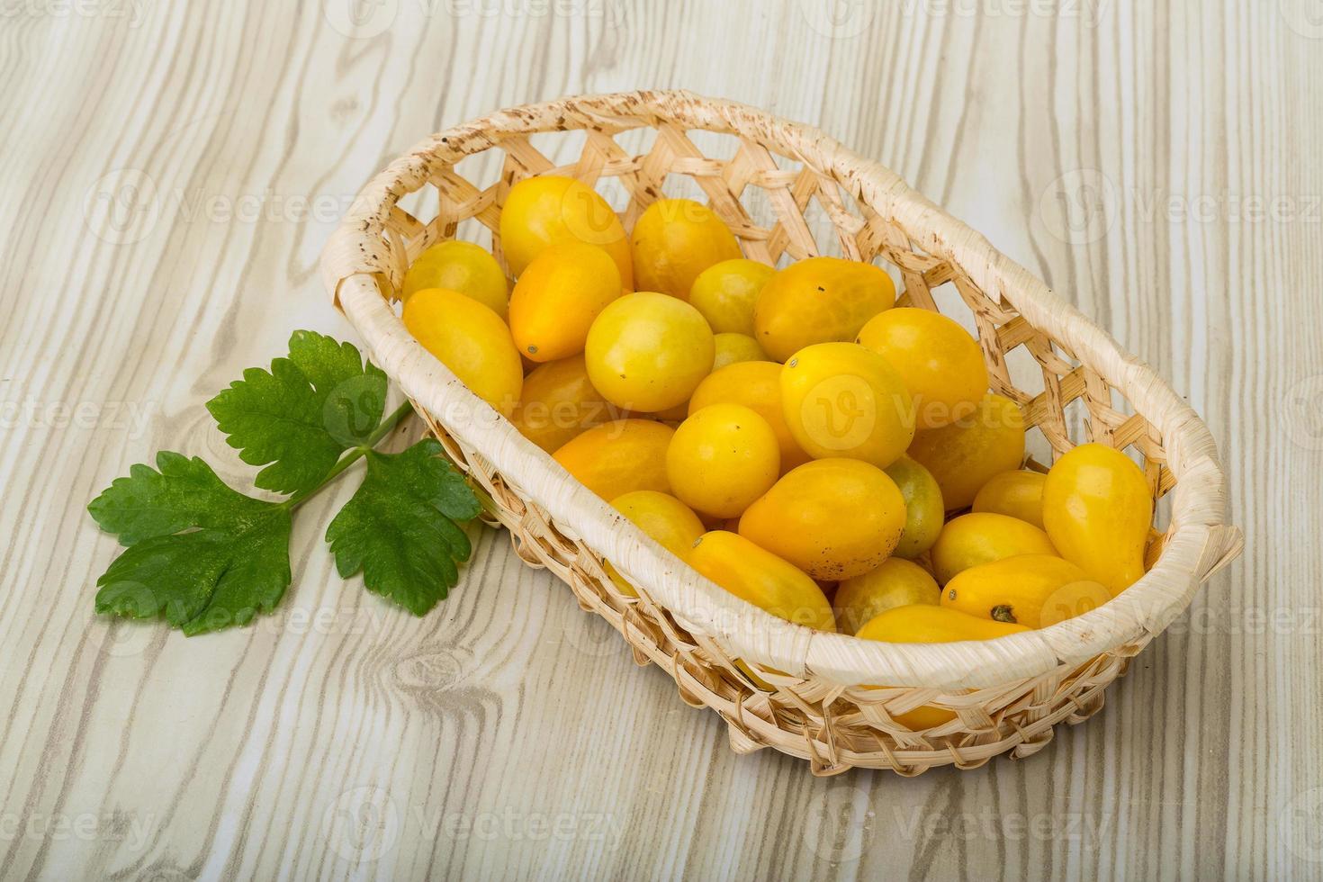 Yellow cherry tomatoes photo