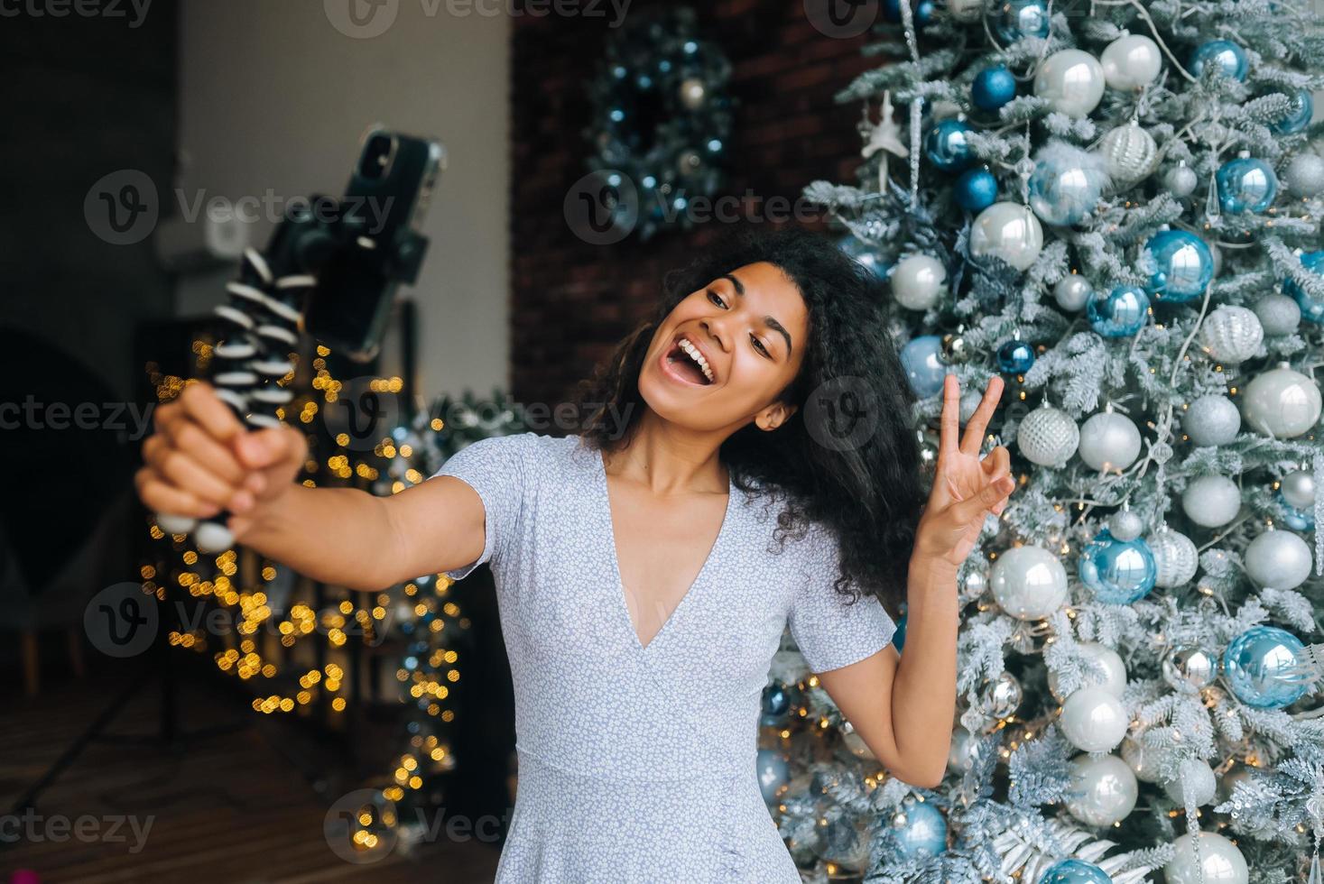 Woman Making Video Message or Selfie Concept of Holidays. photo