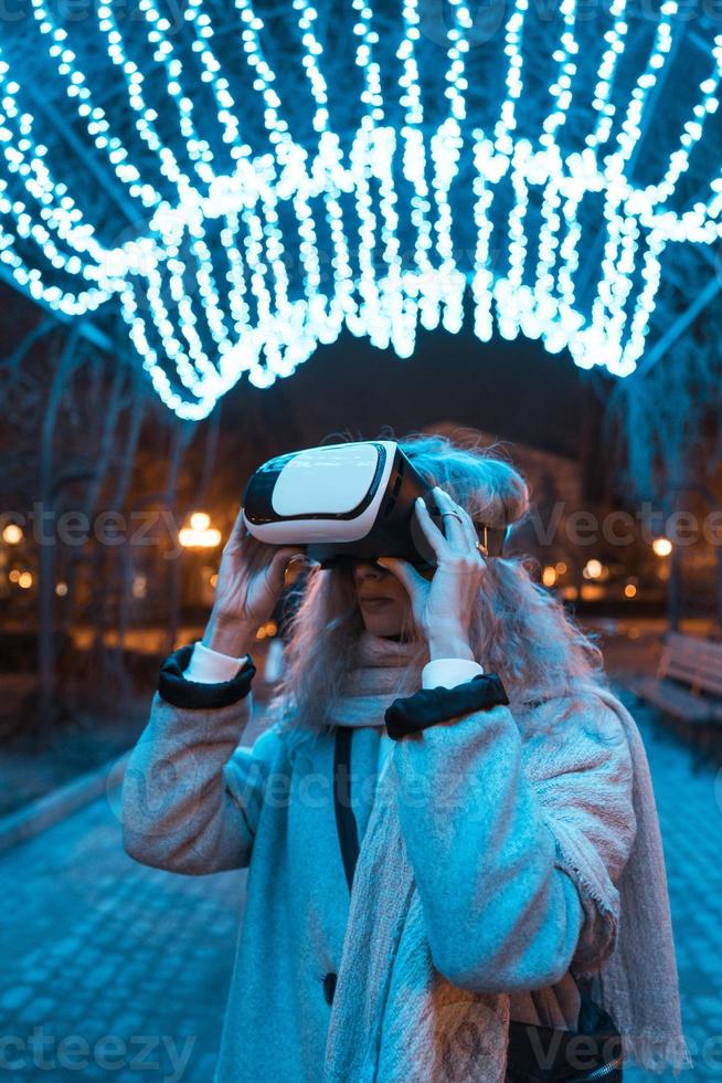 Young girl getting experience VR headset photo