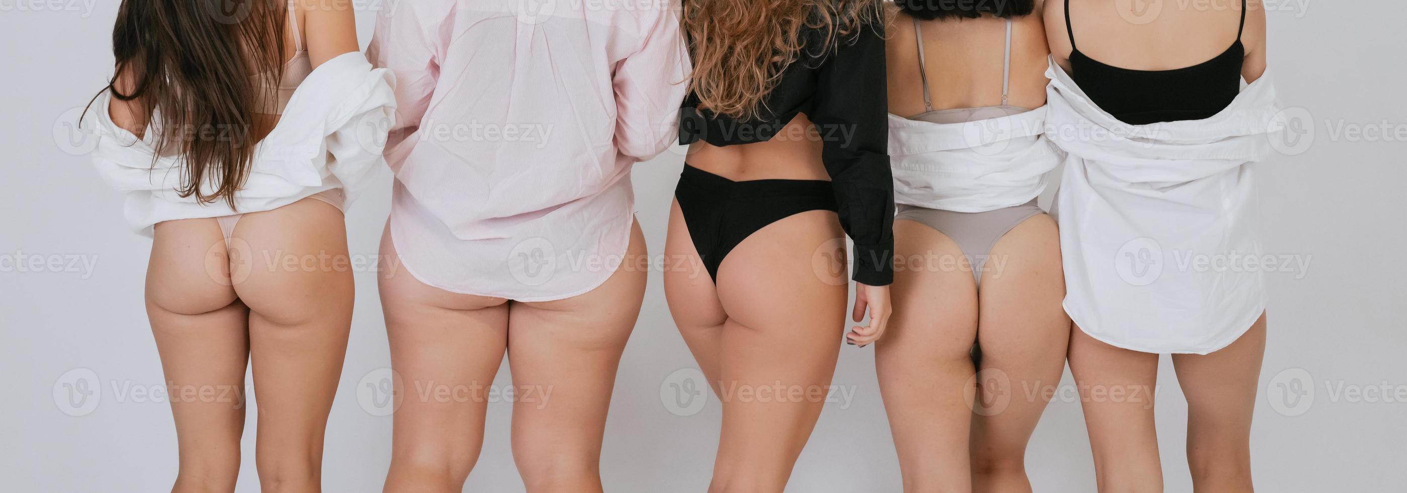 diverse models wearing underwear standing back to camera photo