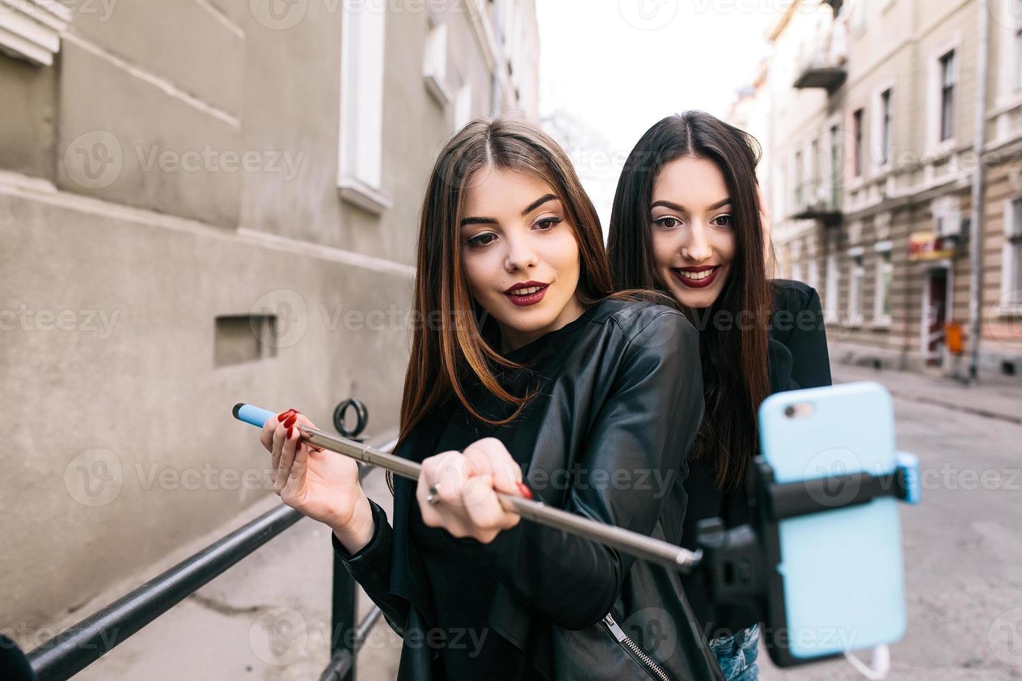 Two young adult girls photo