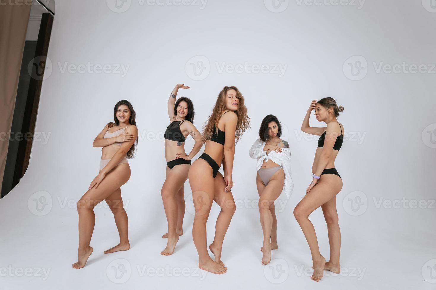 diverse models wearing comfortable underwear, enjoying time together photo