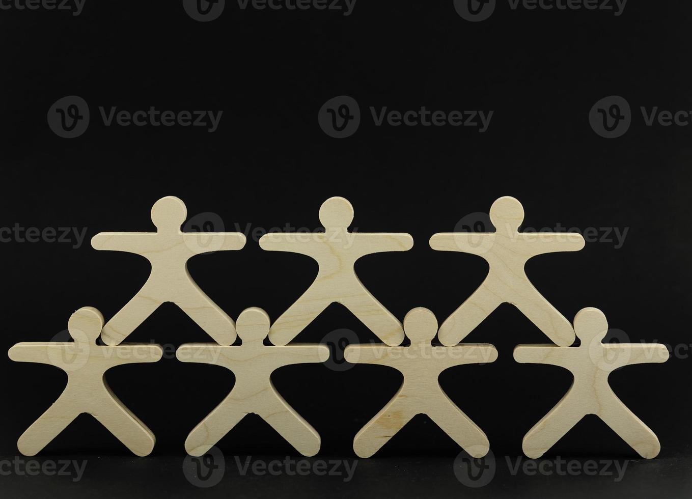 Business team people stand together, first their leader. Team building concept photo