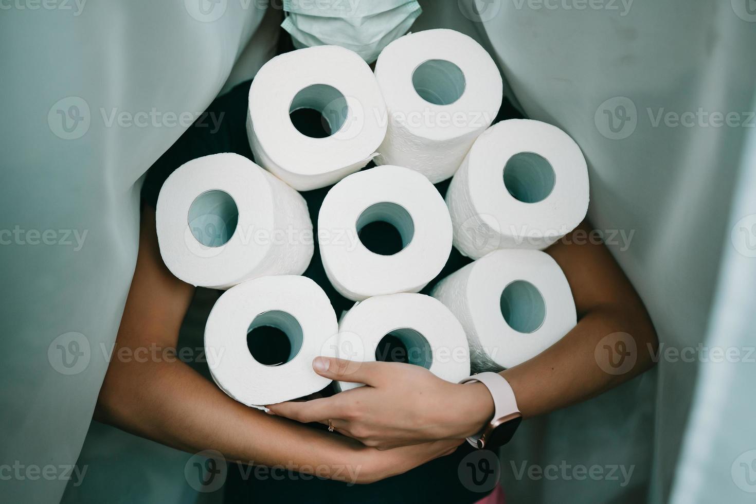 People are stocking up toilet paper for home quarantine from crownavirus. photo