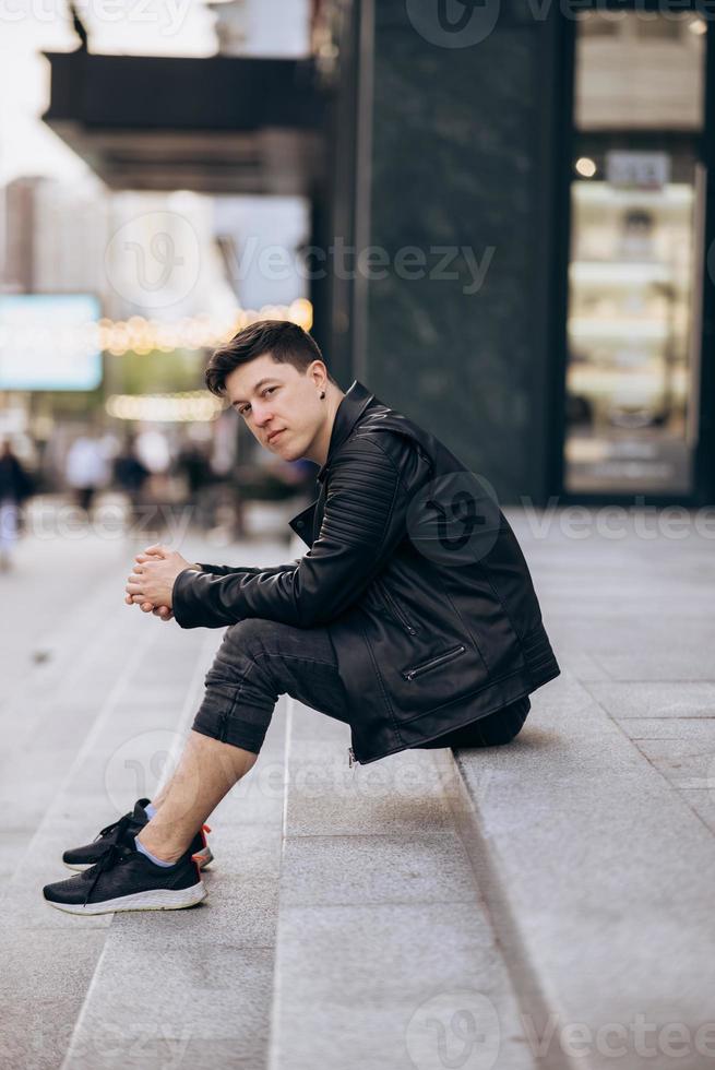 Portrait of man look around. Stylish clothing wear photo