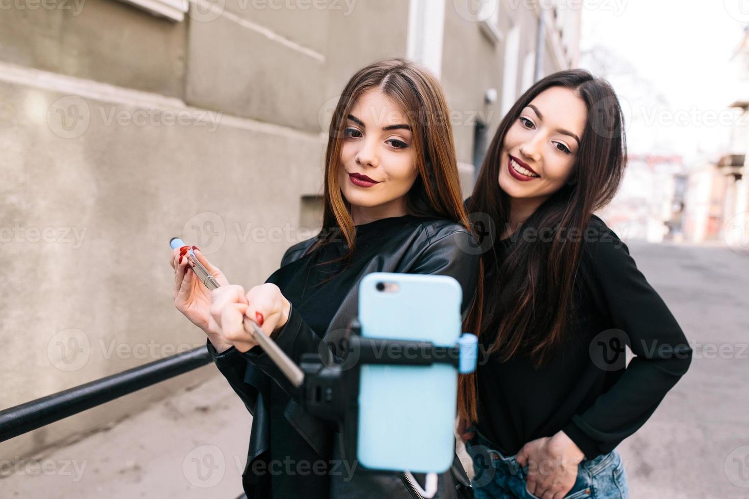 Two young adult girls photo