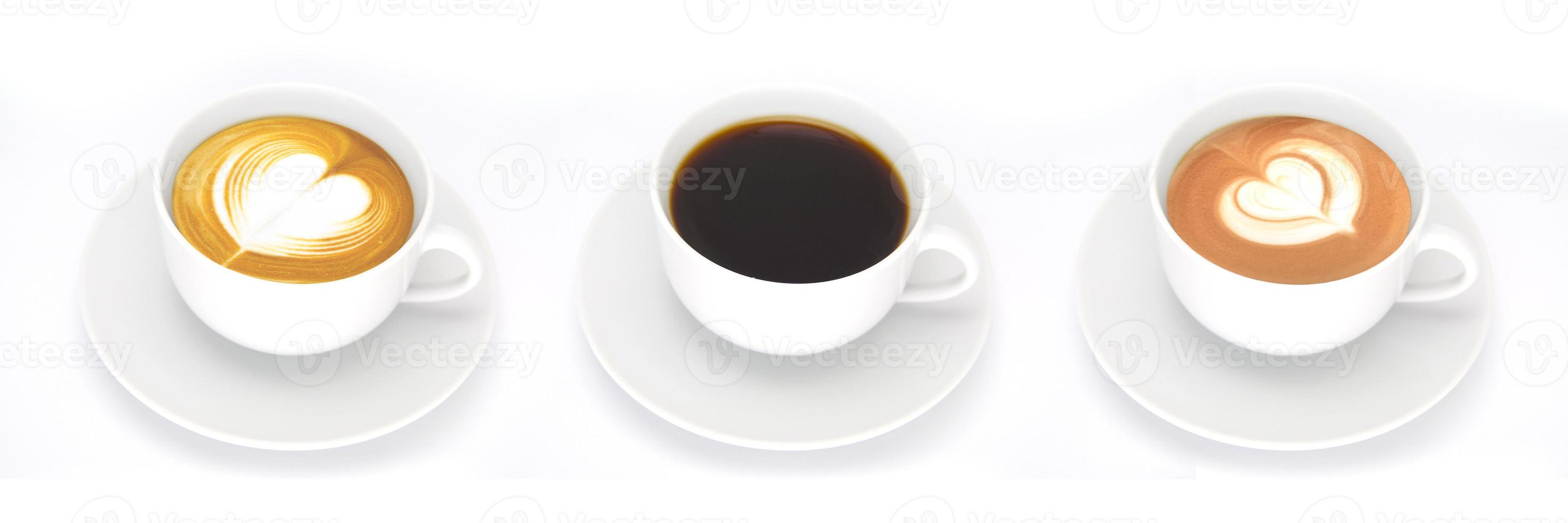 A row of 3 coffee cups full of smooth Americano on a white table with foams and shapes of leaf and heart photo