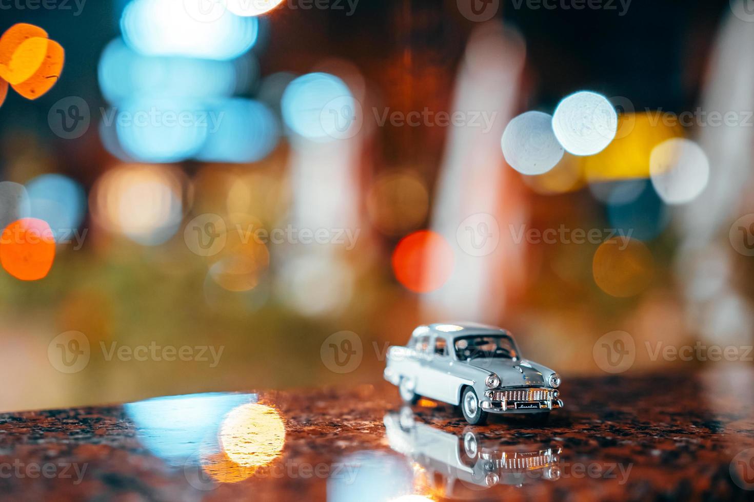 Moskvich 401 on the table, glowing background photo