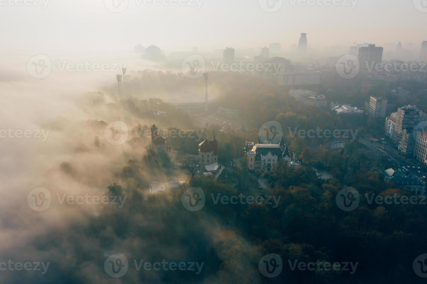 Aerial view of the city in the fog photo