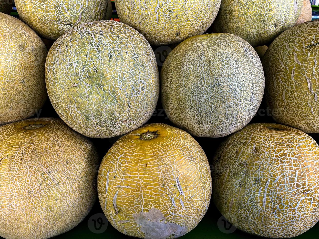 Whole melon, honeydew melon or honeydew melon and food texture close up. Melon at the supermarket. photo