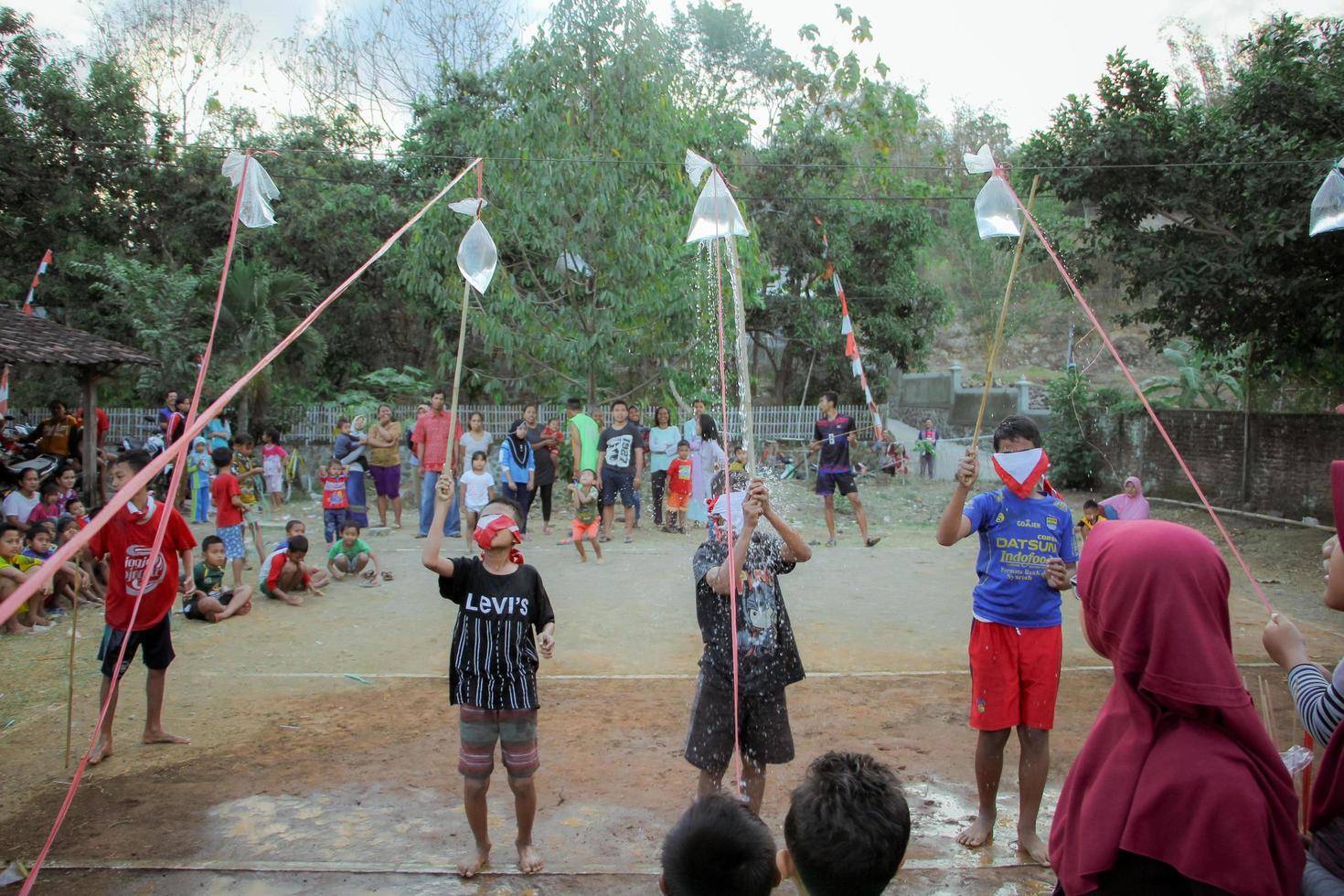 Magetan, Indonesia. August 17, 2022. Indonesian children are happy to celebrate Indonesia's independence day by participating in a competition. photo