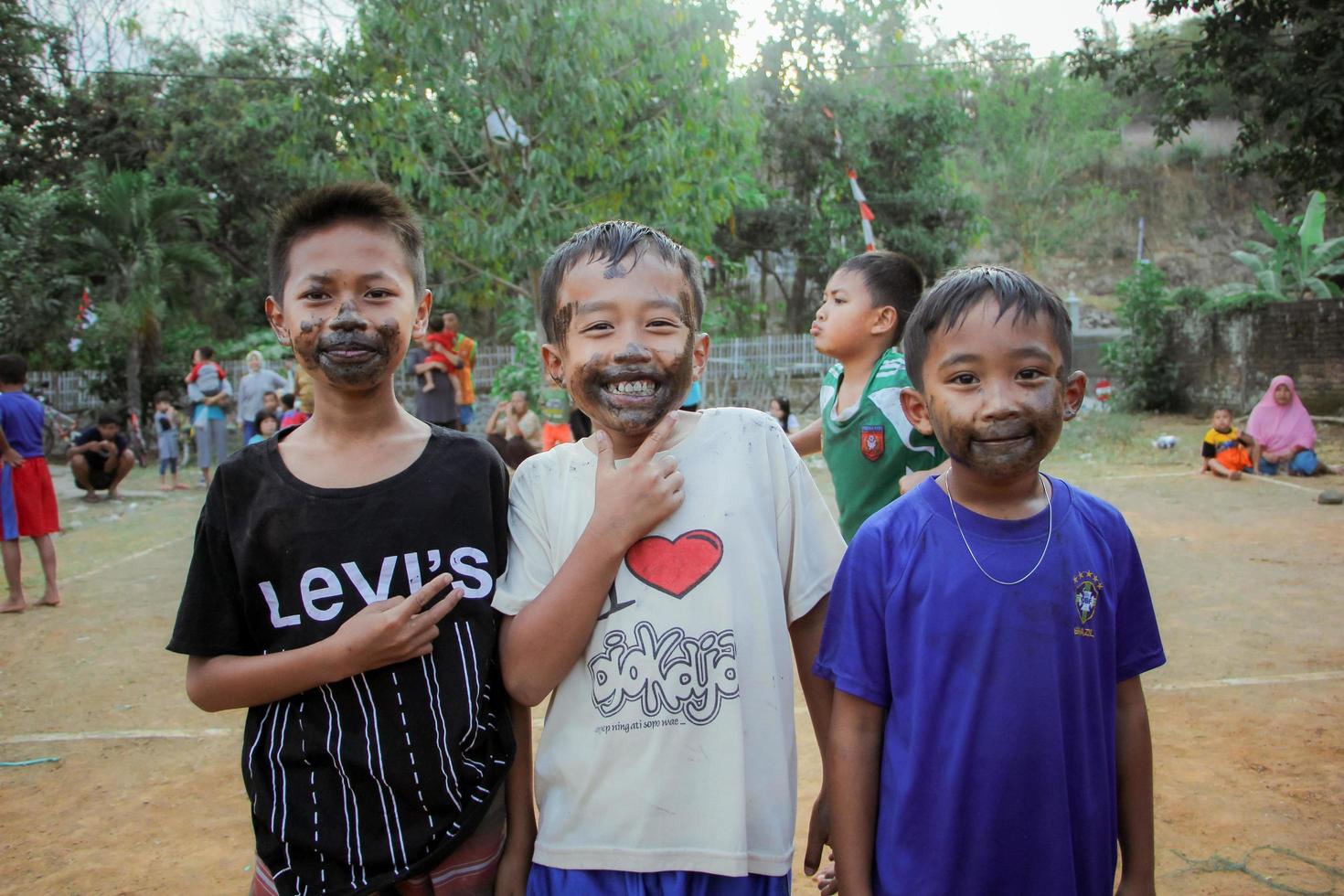 Magetan, Indonesia. August 17, 2022. Indonesian children are happy to celebrate Indonesia's independence day by participating in a competition. photo