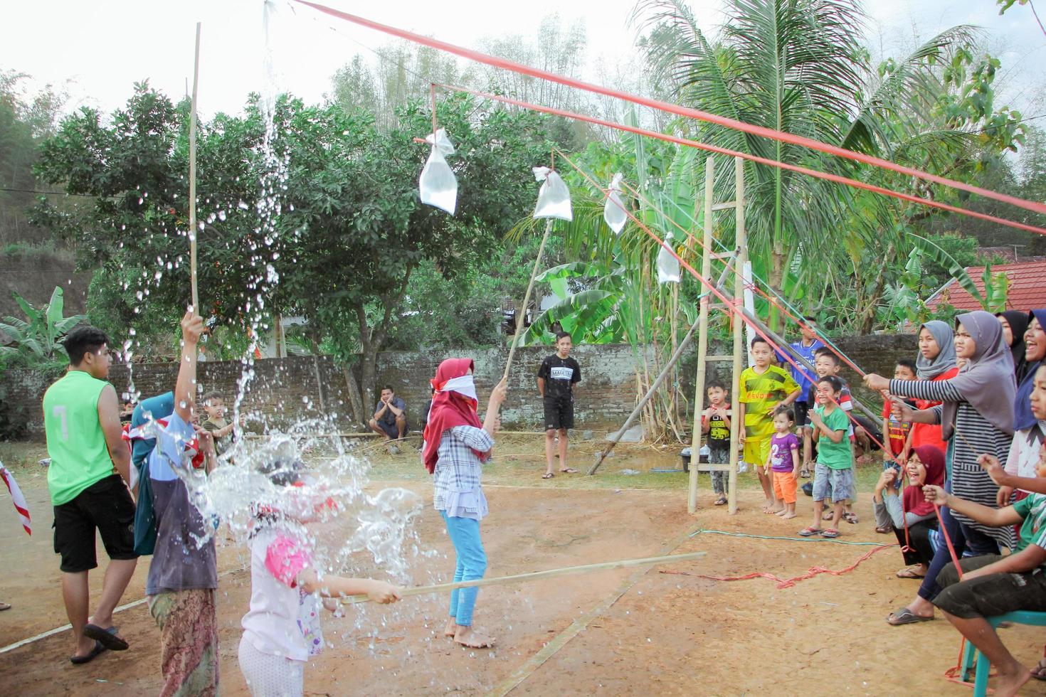 Magetan, Indonesia. August 17, 2022. Indonesian children are happy to celebrate Indonesia's independence day by participating in a competition. photo