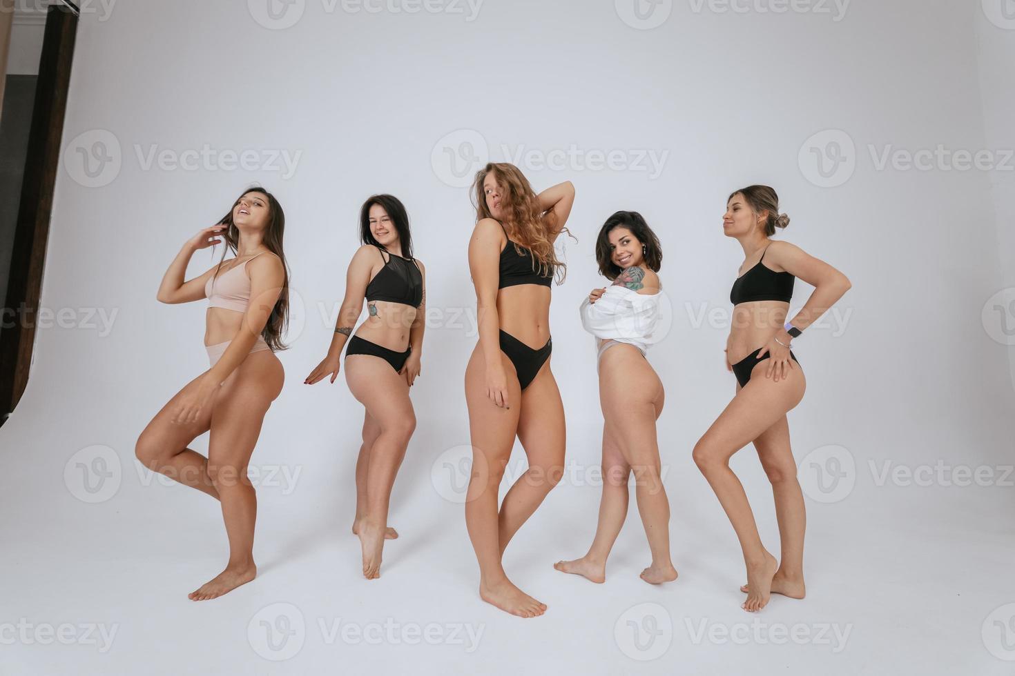 diverse models wearing comfortable underwear, enjoying time together photo