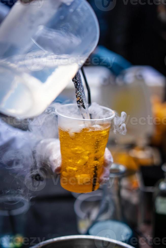 Multicolored alcoholic and non-alcoholic cocktails with straws photo