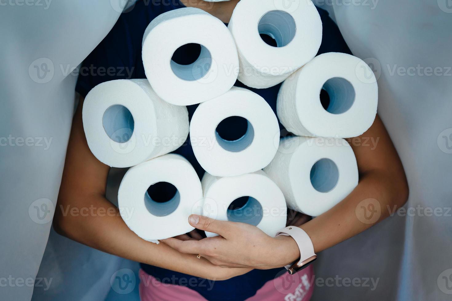 People are stocking up toilet paper for home quarantine from crownavirus. photo