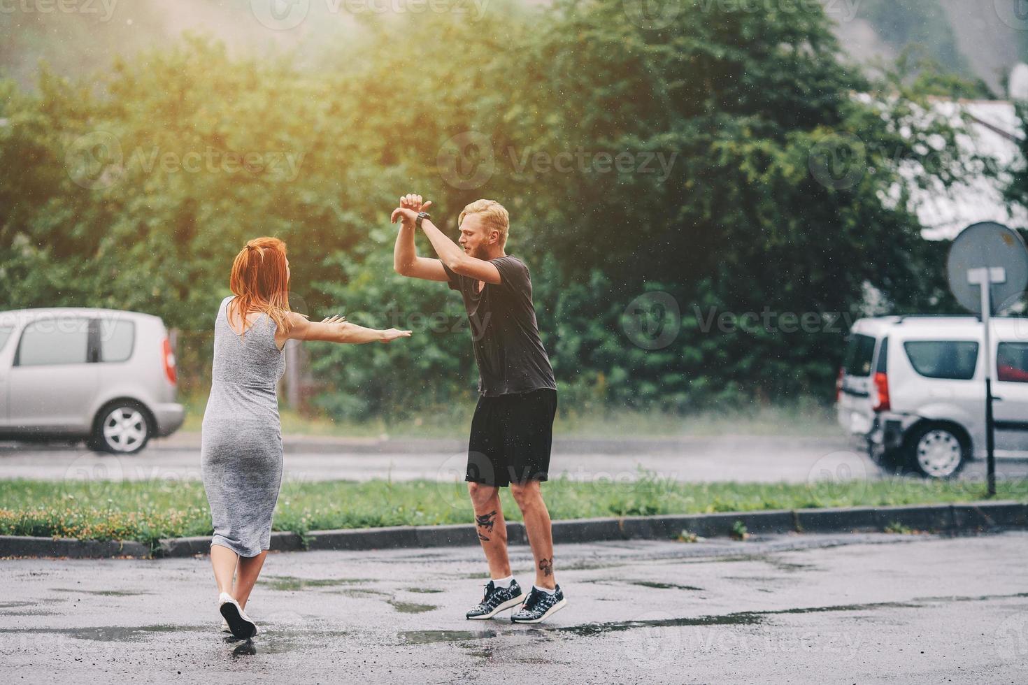 beautiful couple in the rain photo