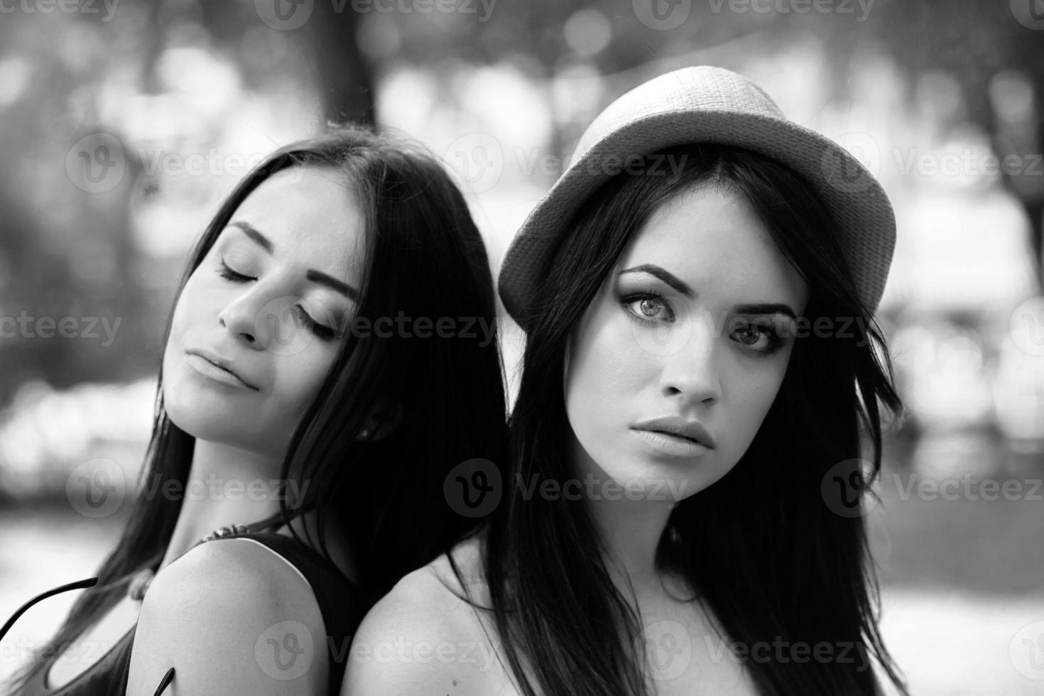 Two young beautiful girls photo